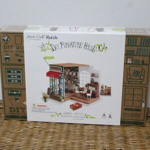 Rolife Hands Craft Simon's Coffee DIY Miniature House Kit.